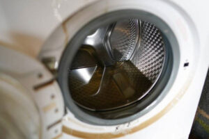 دکمه تخلیه آب ماشین لباسشویی